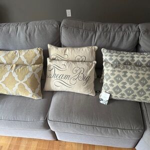 2 Gold and cream pillows